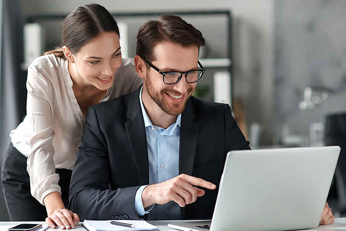 Employee using laptop for leave request